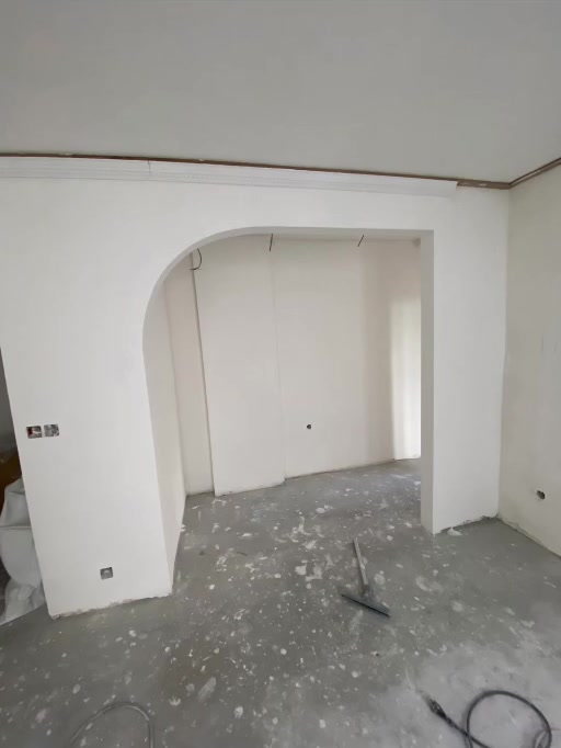 Emplacement avant la réalisation d'une bibliothèque sur mesure